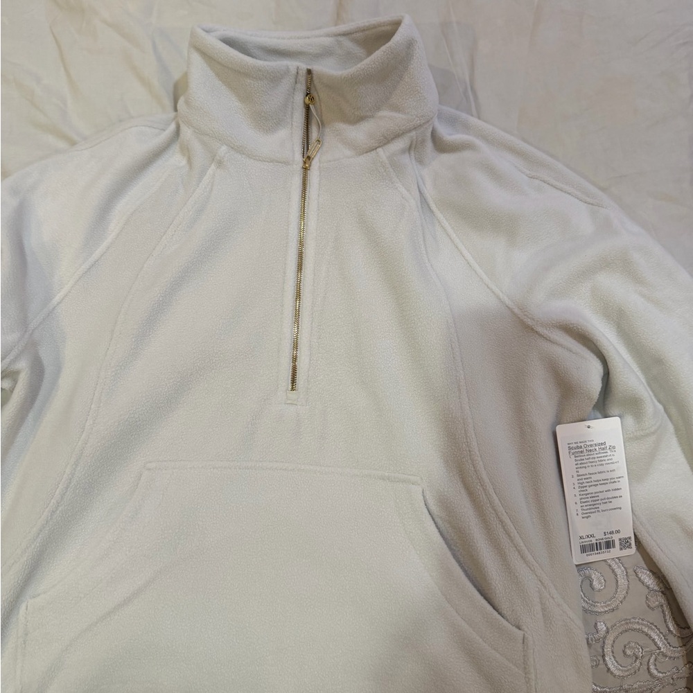 Scuba Tumbled Fleece Funnel-
Neck Half Zip
Colour Bone/Gold
Size XL/XXL - Picture 2 of 10